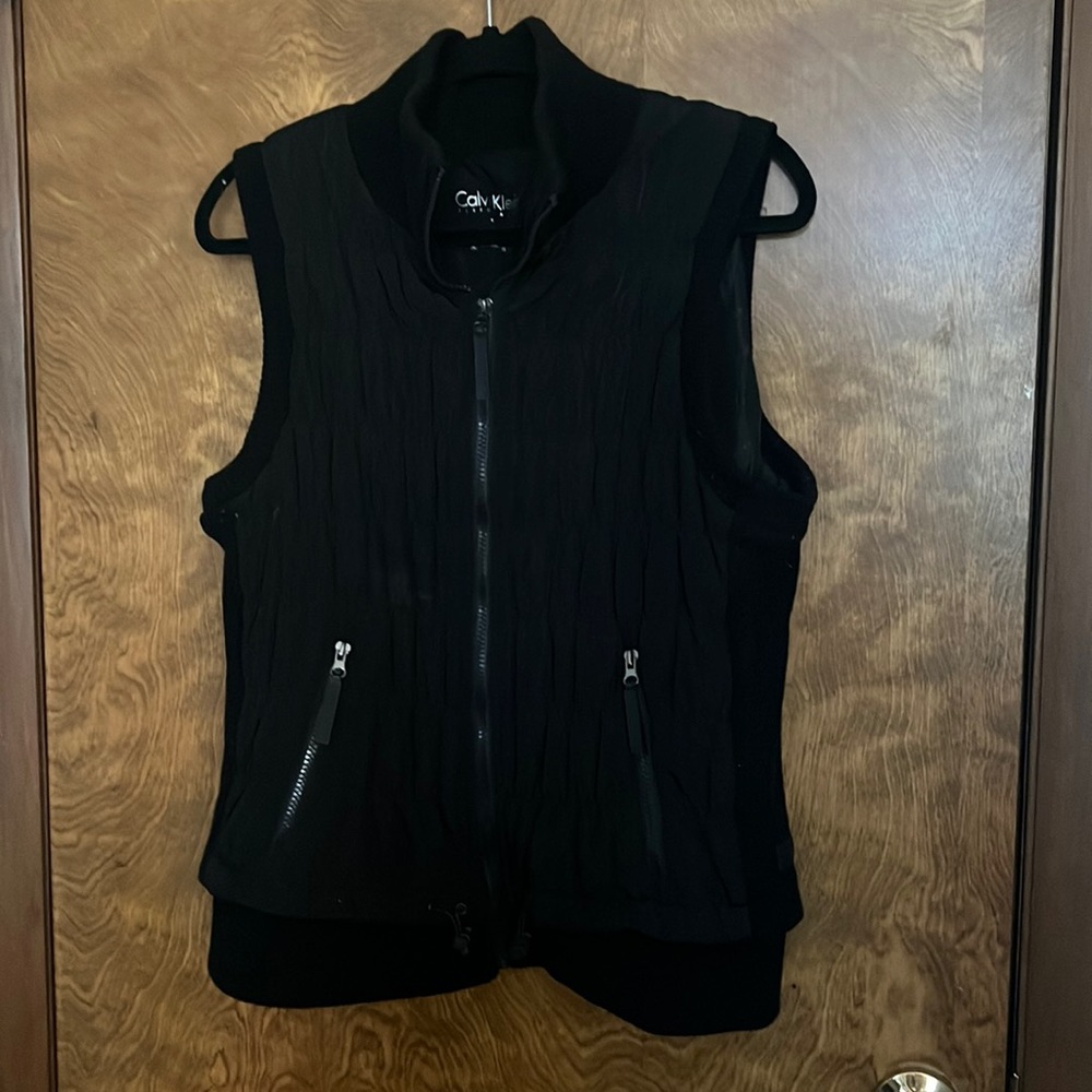 Calvin Klein black vest. Really nice. Size XL